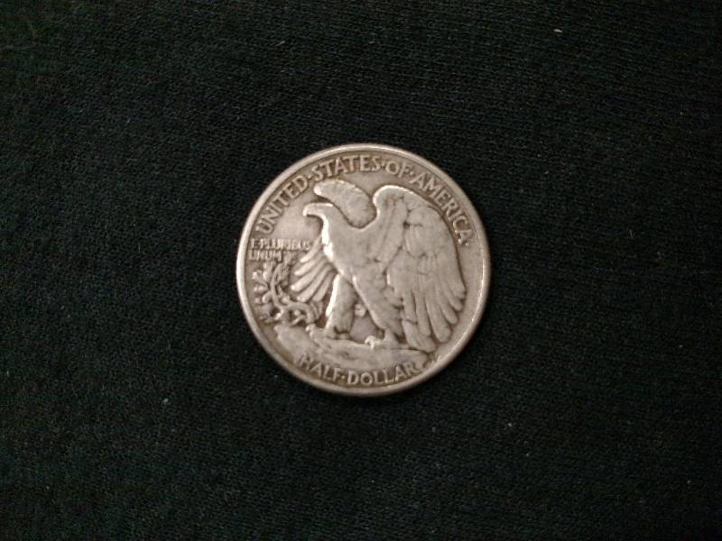lot 34 image: 1944 Walking Liberty Silver Half Do...