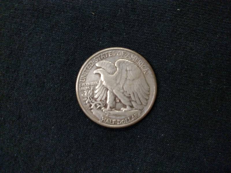 lot 35 image: 1945 Walking Liberty Silver Half Do...