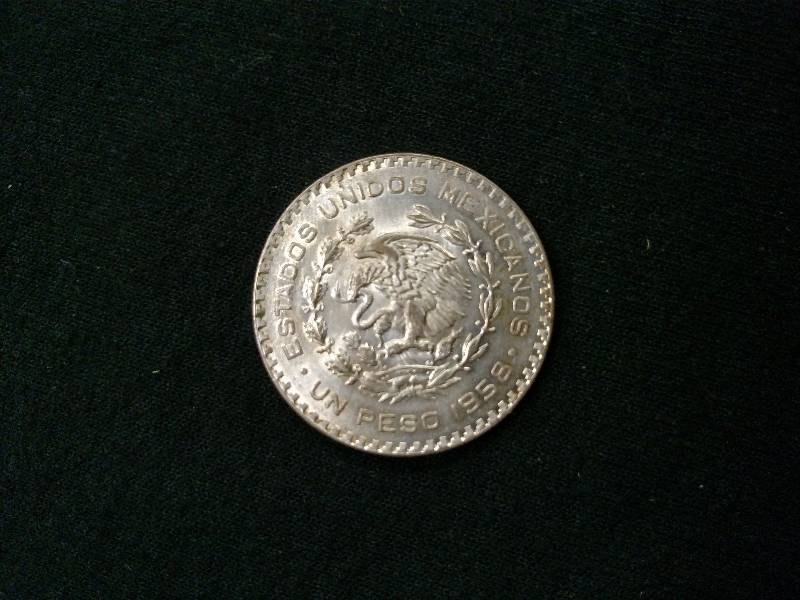 lot 41 image: 1958 Mexico One Peso Silver Coin .1...