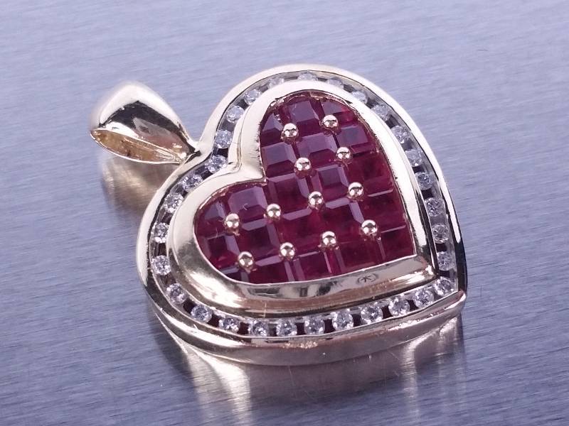 lot 26 image: Natural Ruby and Diamond Pendant 14k