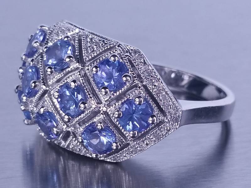 lot 28 image: Natural Tanzanite and Diamond Ring