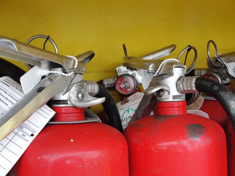 YELLOW CABINET  W FIRE EXTINGUISHER