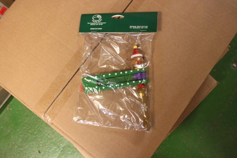 lot 128 image: 84 Pacific Rim Holiday Wooden Noise Makers in Retail Packaging