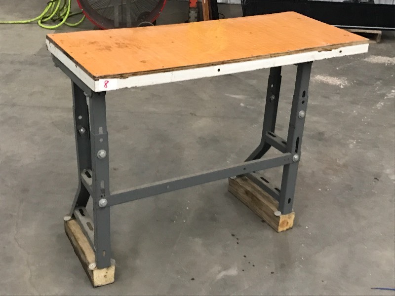 lot 8 image: 4ft Steel Shop Table With Wooden To...
