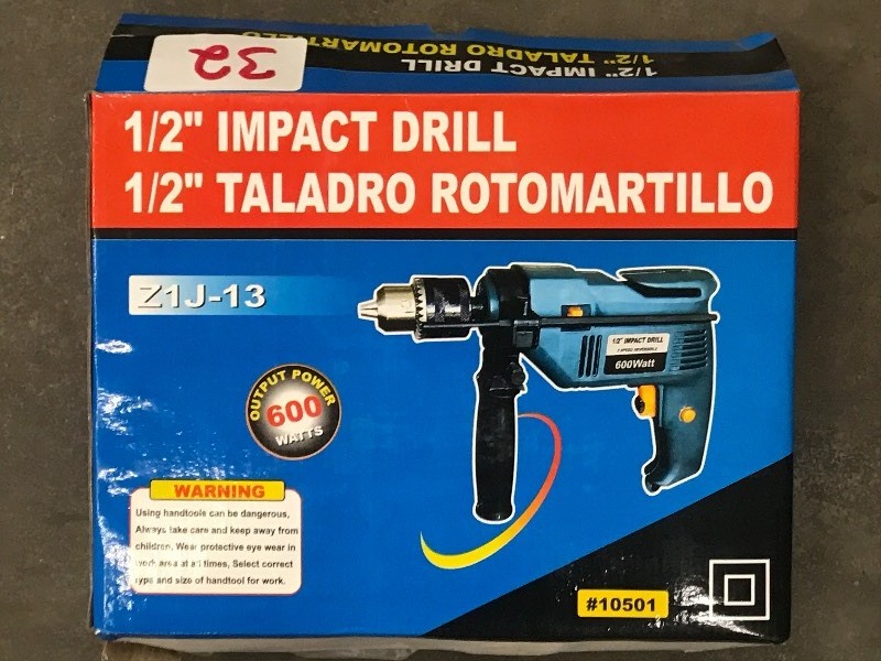 lot 32 image: 115Volt 12 Electric Impact Drill ...
