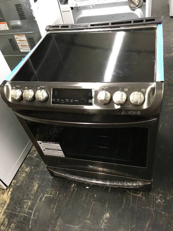 lot 292 image: LG LSE4613BD Smooth Top Stove, Retail $1,899.99