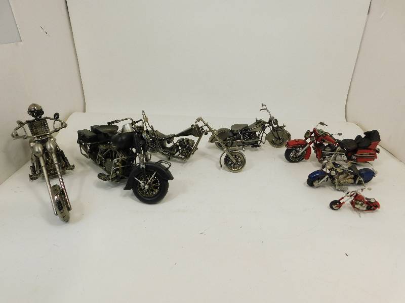 lot 12 image: Seven Various Size Metal Motorcycles