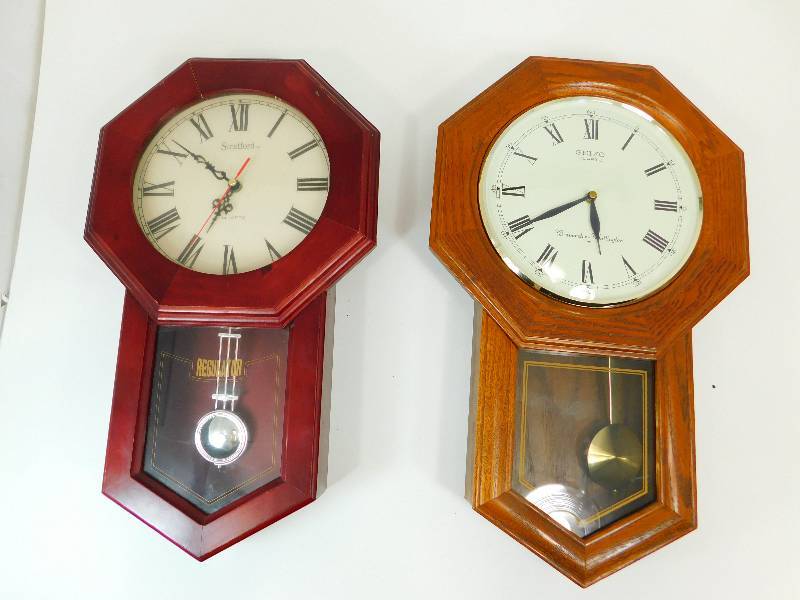 lot 65 image: Two Battery Operated Quartz Wall Clocks With Pendulum