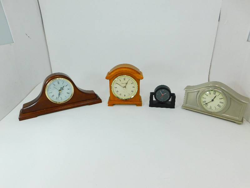 lot 72 image: Four Battery Operated Mantel Clocks