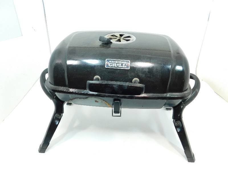 lot 86 image: Black Back Yard Grill With Fold Up Legs