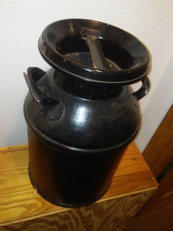 lot 302 image: Vintage milk can, black very nice.