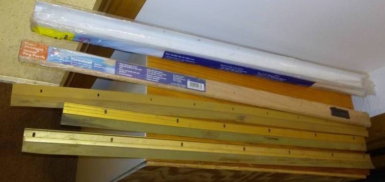 lot 326 image: Oak threshold and 4 door draft sweeps Hardware, new