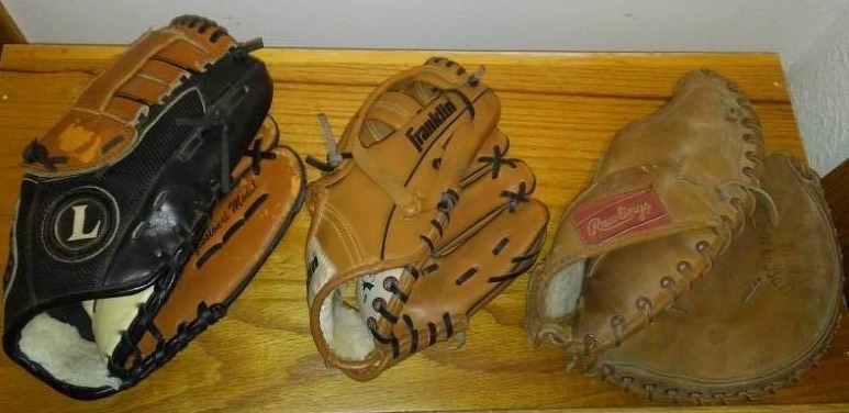 lot 336 image: Base ball softball gloves
