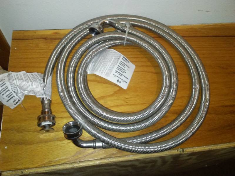 lot 365 image: New Watts stainless steel washing machine hookups, 1 pair, 6 ft.