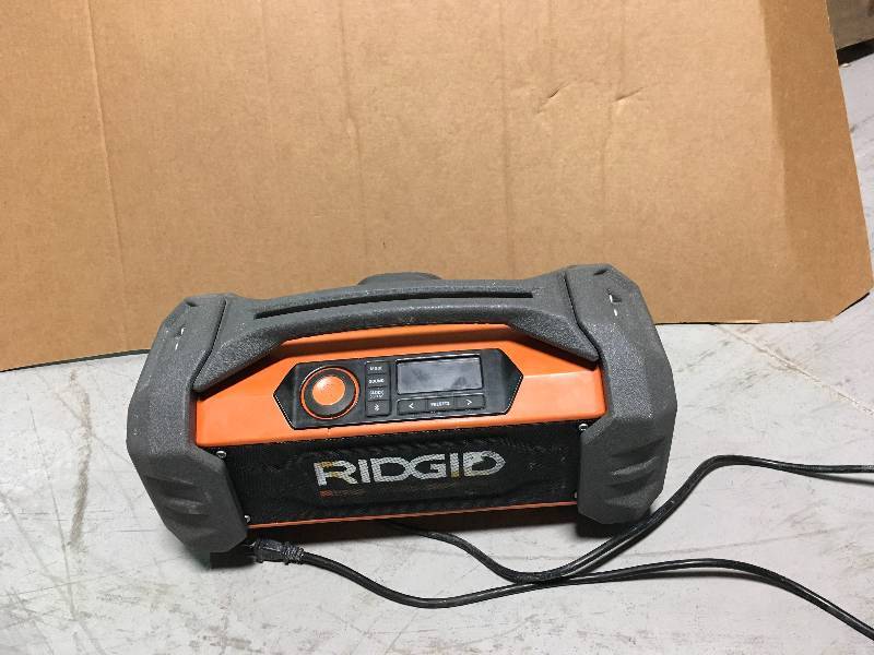 Ridgid 18-Volt GEN5X Jobsite Radio with Bluetooth Wireless Technology in working conditions