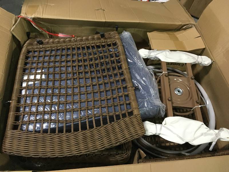 Spring Haven Brown All-Weather Wicker Outdoor Patio Swivel Rocking Chair with Sky Blue Cushions in good conditions