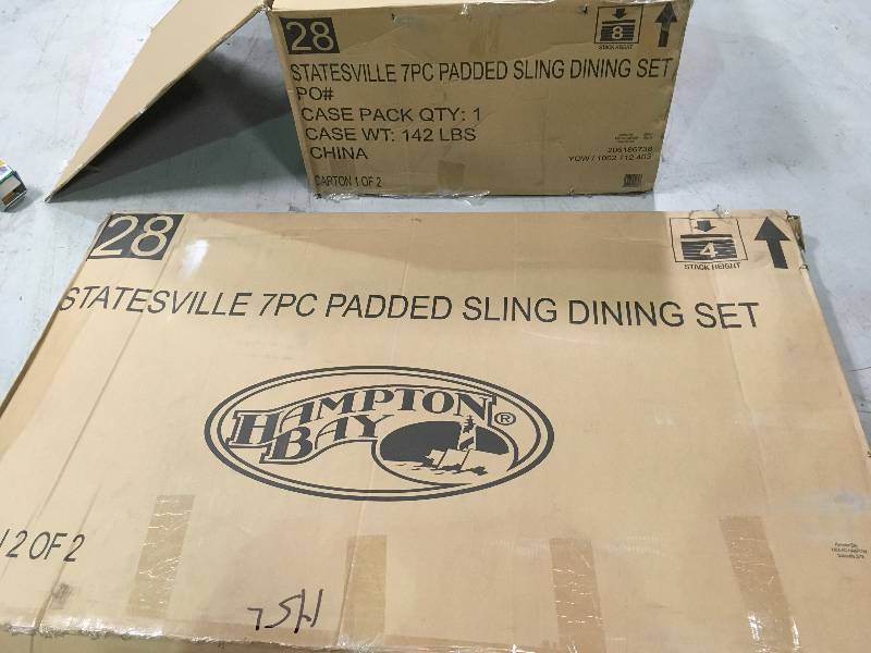 Statesville 7-Piece Padded Sling Patio Dining Set in good conditions