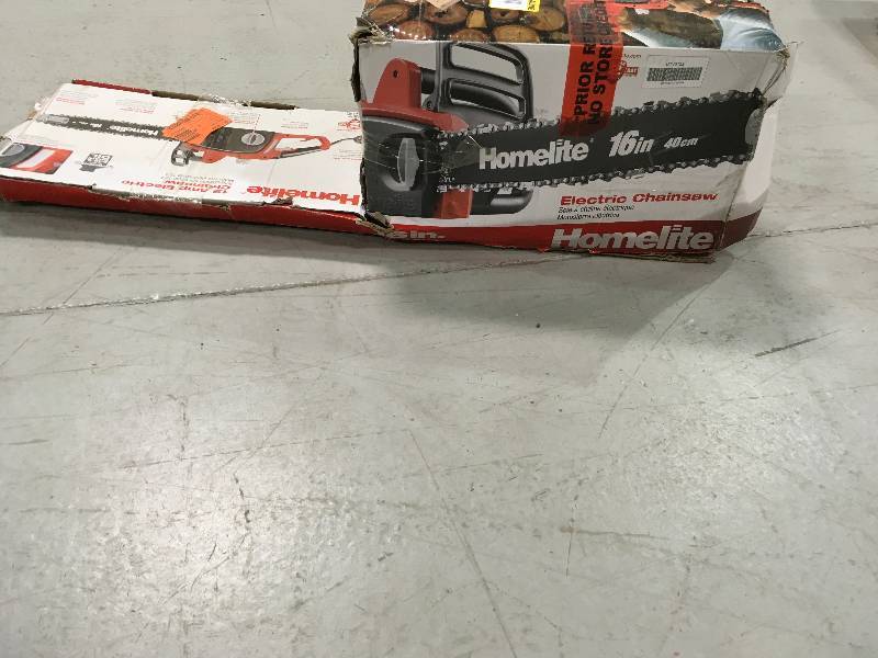 HOMELITE 16 in. 12 Amp Electric Chainsaw used in working conditions