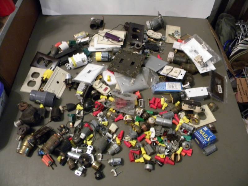 Assorted Electrical Supplies and Hardware in a Sterilite Tote