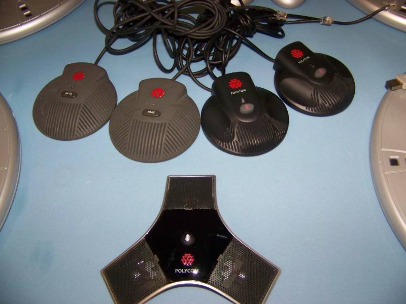 lot 95 image: (4) Polycom  Microsoft Round Tables, (5) Polycom Mic Pods, Calculater and more