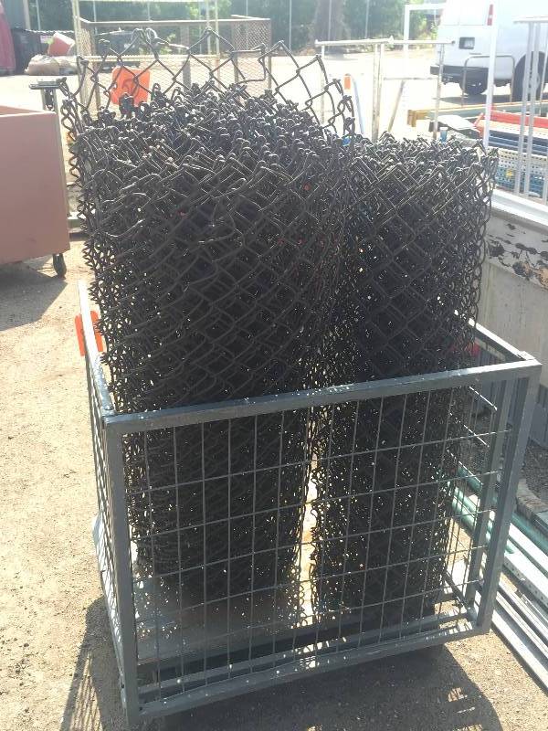 lot 50 image: 2 spools of vinyl coated brown wire fencing