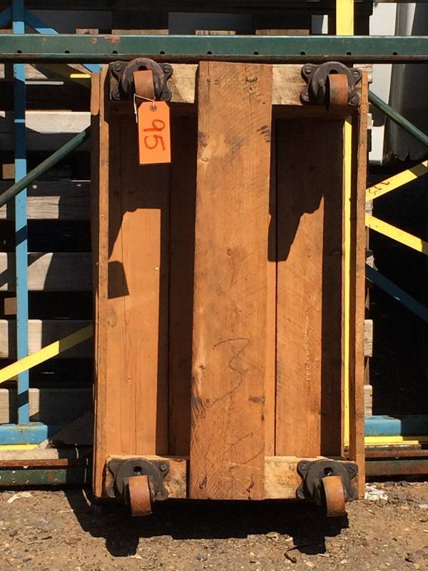 lot 95 image: Wood dolly with vintage wheels