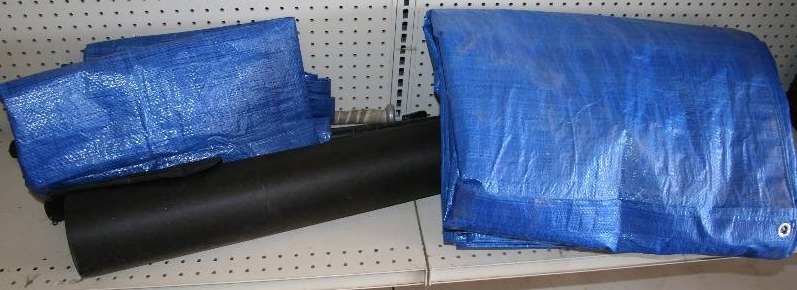 lot 63 image: Tar Paper, Tarps, and Baseball Bats