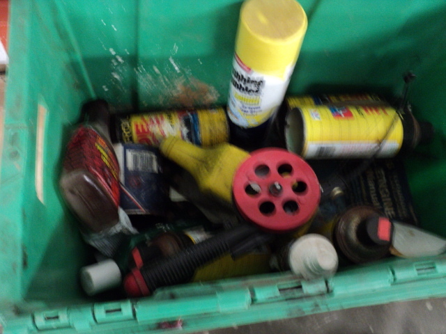 green tote of garage items...
