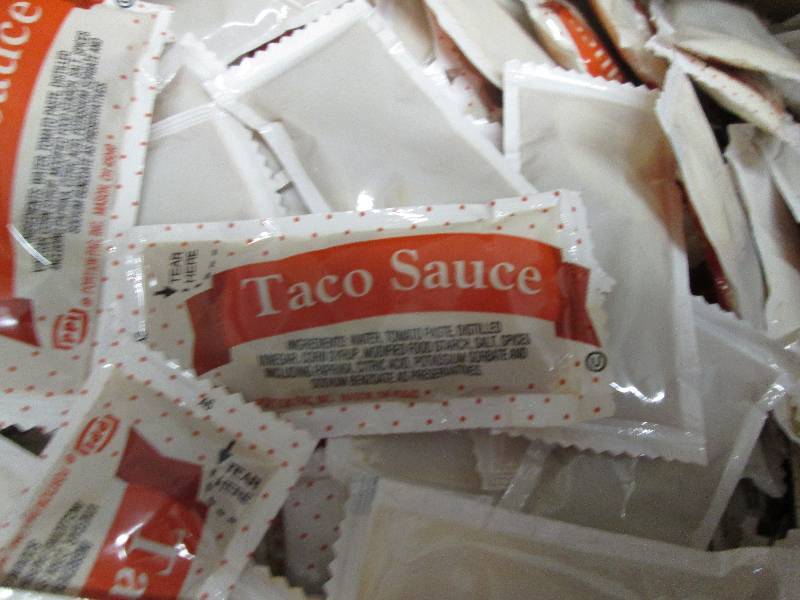 lot 18 image: Case of Taco Sauce Packets...