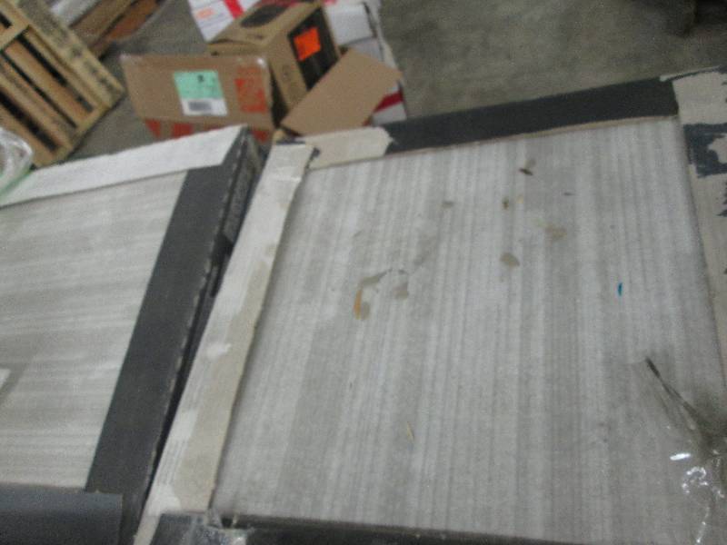 lot 202 image: 7 Cases MSI Rug Bianco 18 in. x 18 ...