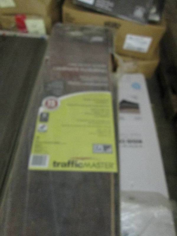 lot 276 image: 4 Cases Trafficmaster Dark Brown Hi...