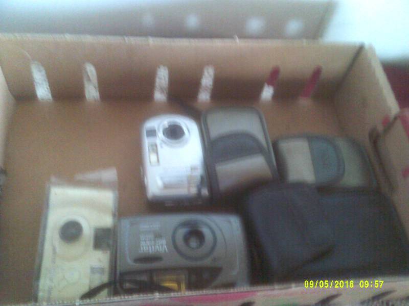 CAMERAS SOME DIGITAL AND USED CELL PHONES