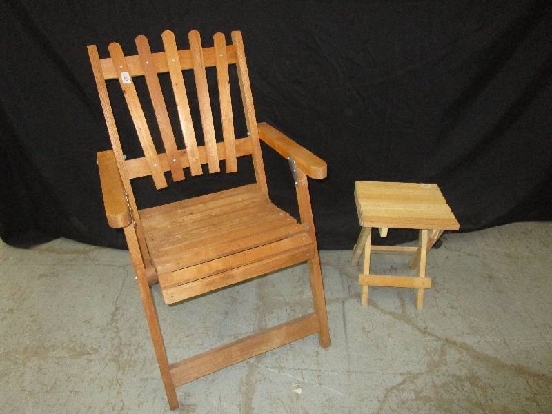 lot 134 image: Wooden Lawn Chair with a wooden side table, chair is 3 feet tall, 2 feet deep and 2 feet wide. Table is 16 tall X13 wide X11 deep