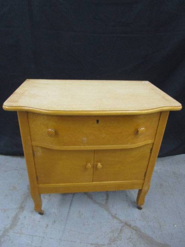 lot 136 image: Old dresser on wheels 29 Tall X 29.5 wide X 18 deep