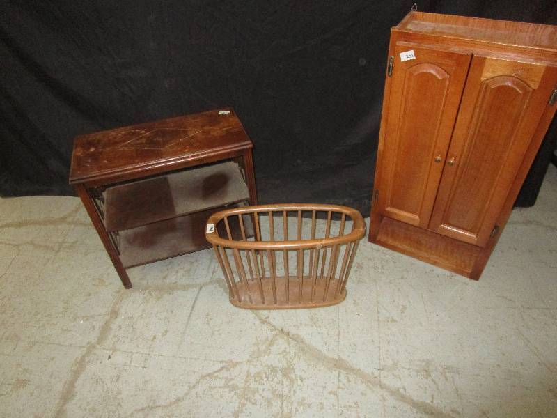 lot 149 image: One small stand, a magane basket along with a cupboardshelve