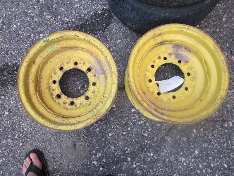 lot 22 image: Qty. 2 with tags 16 x 8 wide 8 lug rims