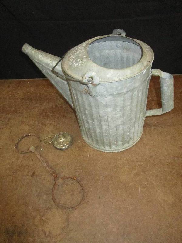lot 50 image: Old Sprinkler can, steering wheel handle and bit