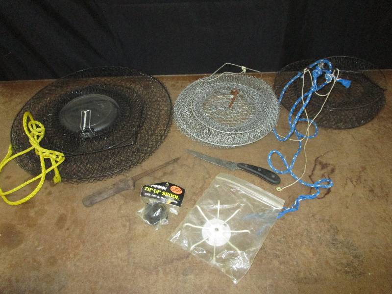 lot 56 image: fishing nets knives and fishing pole holder