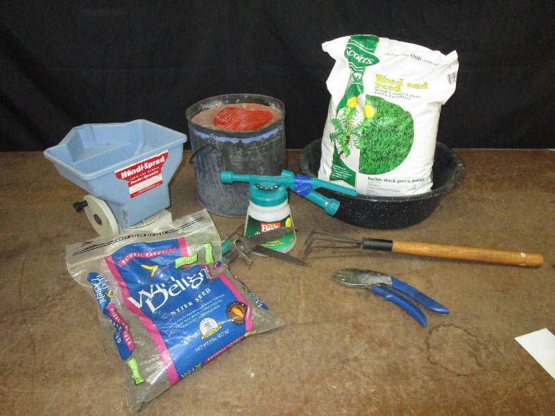 lot 82 image: weed and feed, minnow bucket with twine, seeder, grass seed and more