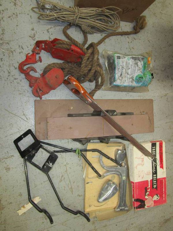 lot 101 image: Pulleys and hooks, she shine holder, bike brackets and more