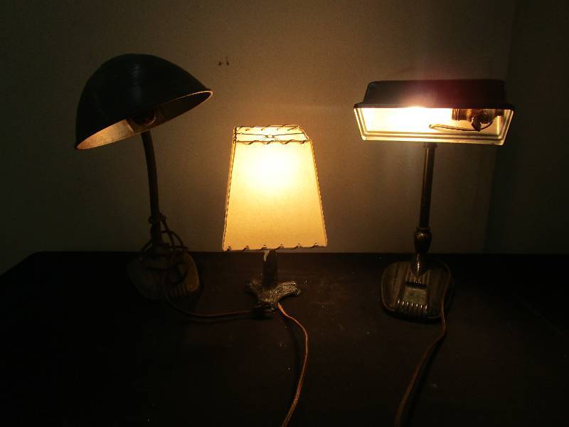 lot 109 image: 3 cast iron bottom old lamps