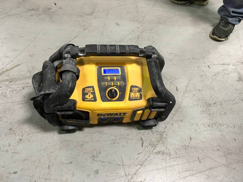 DeWalt 2800 Peak Amp Jump Starter 1000-Watt Power Inverter with Digital Compressor in working conditions
