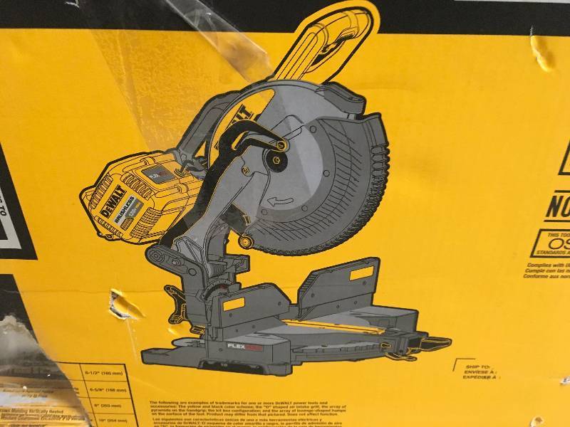lot 10 image: DEWALT FLEXVOLT 120-Volt MAX Lithium-Ion Cordless Brushless 12 in. Sliding Miter Saw w AC Adapter tool only not used