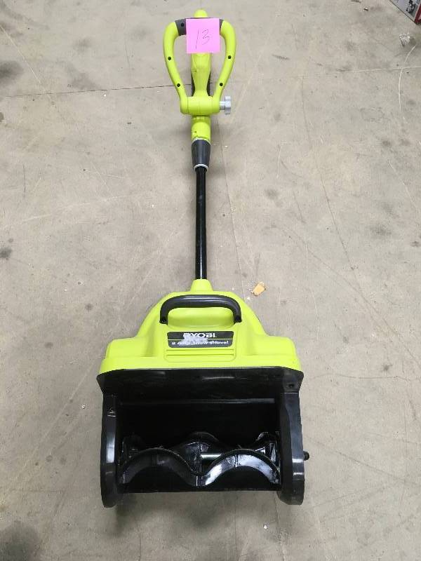 lot 13 image: RYOBI 12 in. 8-Amp Corded Electric Snow Blower Shovel in working conditions