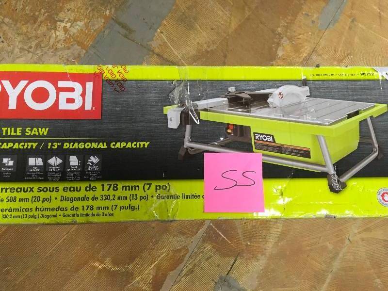 lot 55 image: RYOBI 7 in. 4.8 Amp Tabletop Tile Saw  USED In  good working  condition