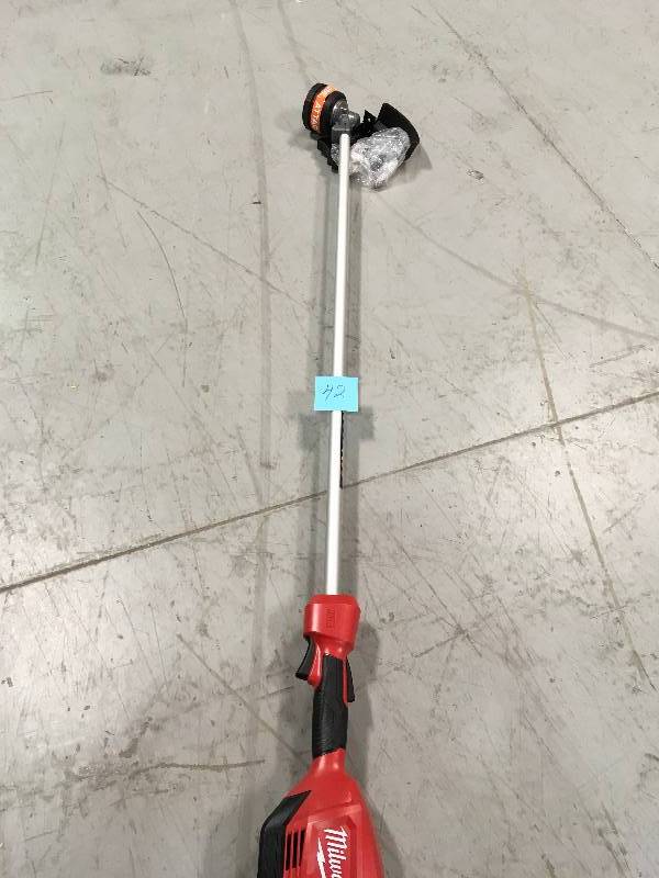 lot 42 image: Milwaukee M18 FUEL 18-Volt Lithium-Ion Brushless Cordless String Trimmer  in working conditions