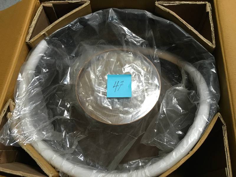 lot 47 image: 38 in. Hammered Chimenea Copper Fire Pit in good conditions