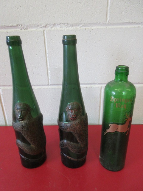 lot 414 image: VINTAGE GREEN GLASS BOTTLES
