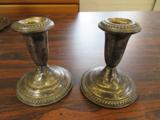 lot 424 image: 2 EMPIRE STERLING CANDLESTICK HOLDERS