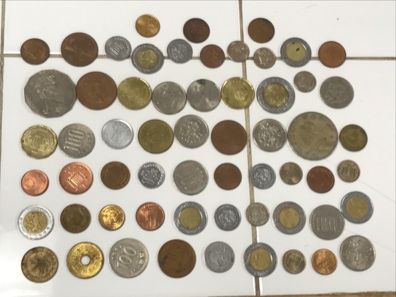 (60) Assorted Foreign Coins At Lea...